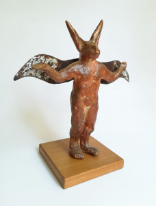 wood-fired ceramic sculpture by Katja Abbott of a rabbit with wings