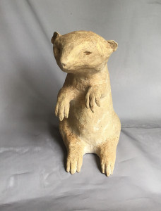 Wood-fired ceramic sculpture by Katja Abbott of a badger or ratel